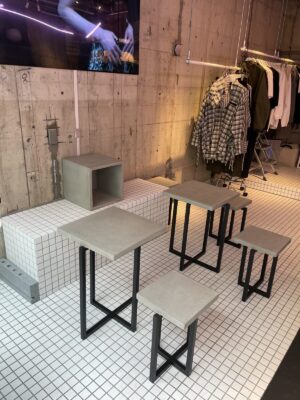 アパレルショップ「WANSIE」モルタル什器で魅せる空間演出